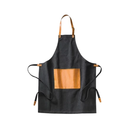 Robust apron in stonewashed canvas 500 gsm with vegan leather details. An apron that ages with dignity. (NAX-VG017-03)
