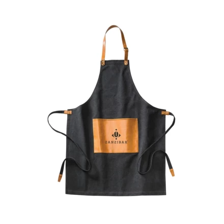 Robust apron in stonewashed canvas 500 gsm with vegan leather details. An apron that ages with dignity. (NAX-VG017-03)